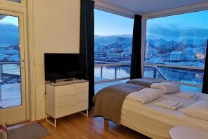 bedroom view in autumn from fishermens rorbuer cabin svolvær lofoten norway