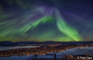 Northern Lights Cable Car Aurora Borealis in the sky with tromso birds eye view above at night